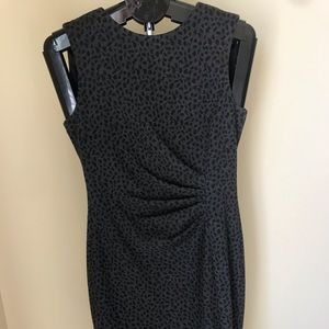 Black leopard print below the knee dress